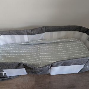 Gray and White Baby Bassinet